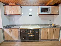 Detalle cocina carbón Casa 2